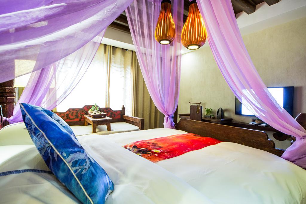 Lijiang Yuntian Palace Hotel Kamer foto